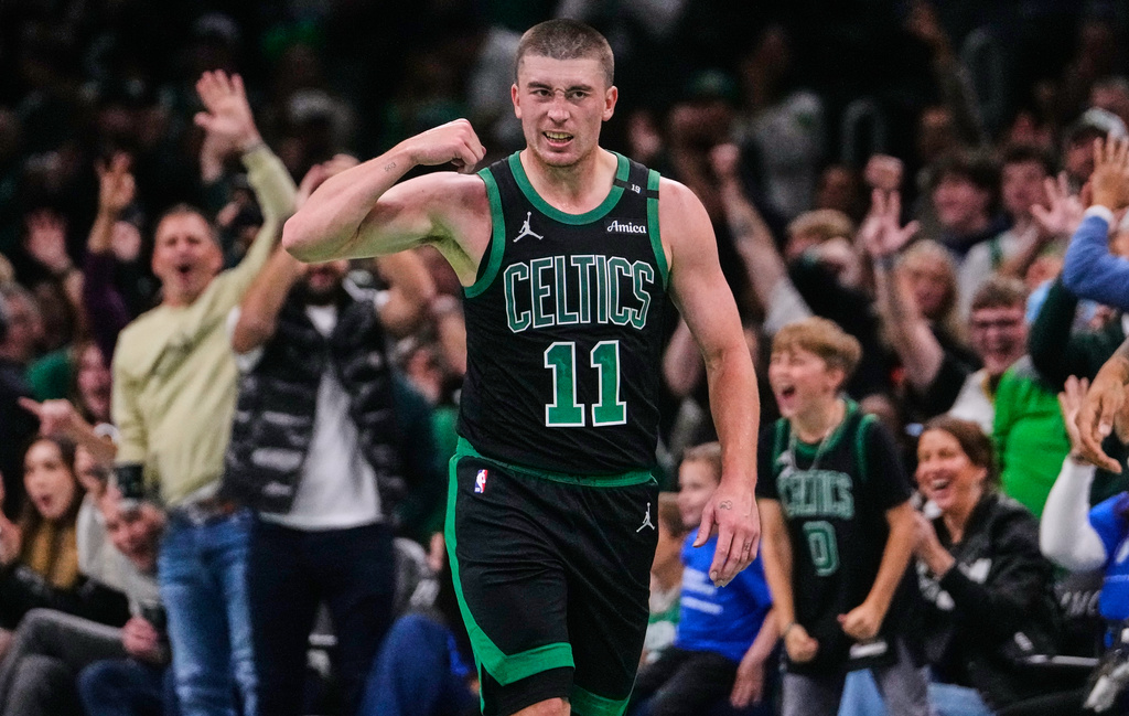 Boston Celtics' Payton Pritchard pumps his fist after hitting a 3-point basket against the Chicago Bulls during the first half of an NBA Cup basketball game, Friday, Oct. 30, 2026, in Boston. (AP Photo/Charles Krupa)