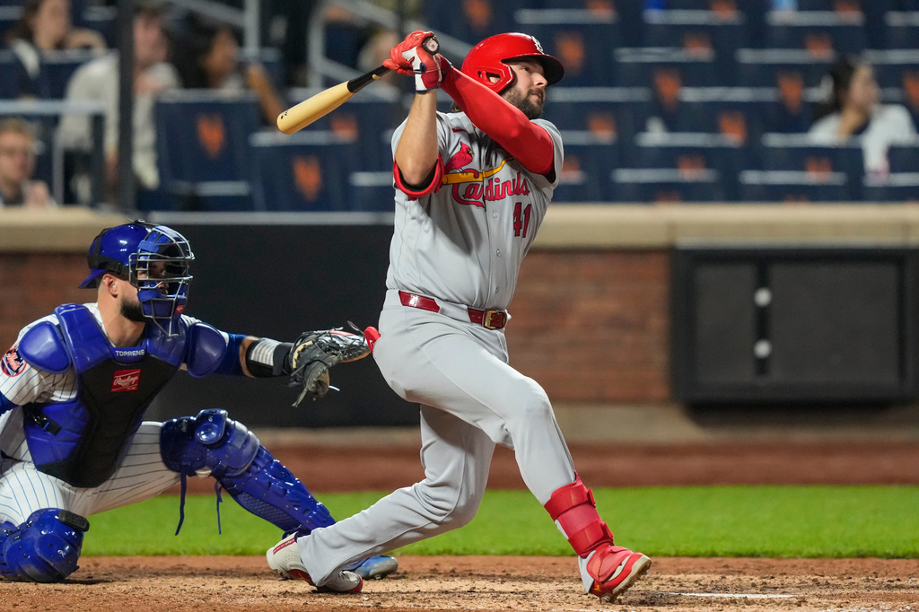 St. Louis Cardinals' Alec Burleson hits a home run during the ninth inning of a baseball game against the New York Mets, Wednesday, June 10, 2026, in New York. (AP Photo/Yuki Iwamura)