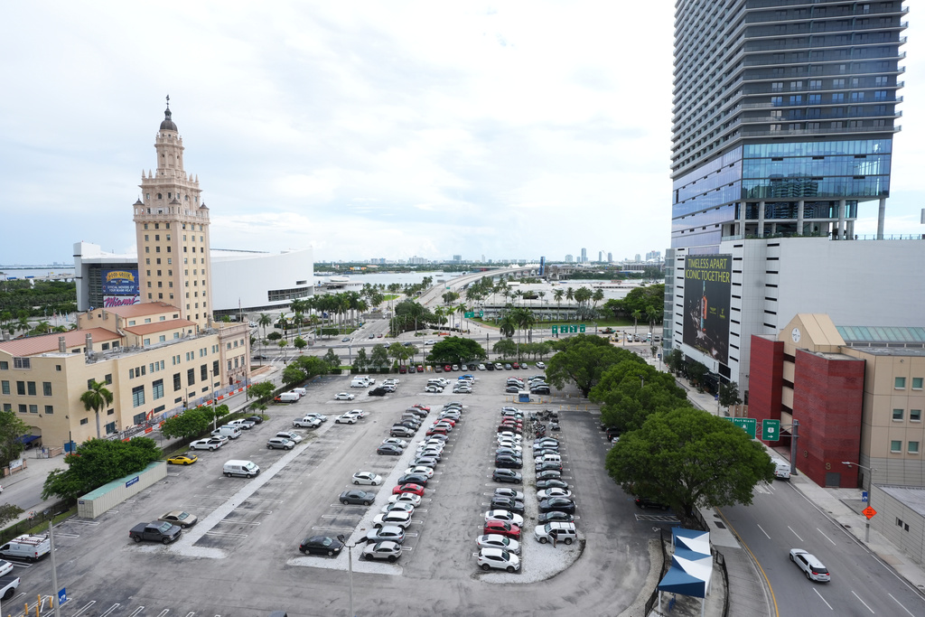 Republican Florida Gov. Ron DeSantis is proposing that President Donald Trump's presidential library be built in a parking lot that is currently used by Miami-Dade College staff and faculty and is adjacent to the Freedom Tower, Tuesday, Sept. 23, 2025, in Miami. (AP Photo/Marta Lavandier)