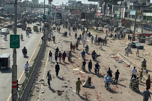 Local residents stand by burnt vehicles after police in Pakistan clashed with thousands of protesters during a march in support of Palestinians, in Muridke near Lahore, Pakistan, Monday, Oct. 13, 2025. (AP Photo/Jahanzeb Khan) Local residents stand by burnt vehicles after police in Pakistan clashed with thousands of protesters during a march in support of Palestinians, in Muridke near Lahore, Pakistan, Monday, Oct. 13, 2025. (AP Photo/Jahanzeb Khan)