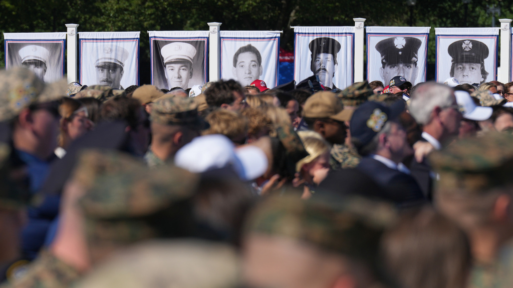 Photos are on display during the Tunnel to Towers Foundation event for the 25th Anniversary of 9/11, on the Ellipse near the White House in Washington, Tuesday, Sept. 8, 2026. (AP Photo/Jacquelyn Martin)