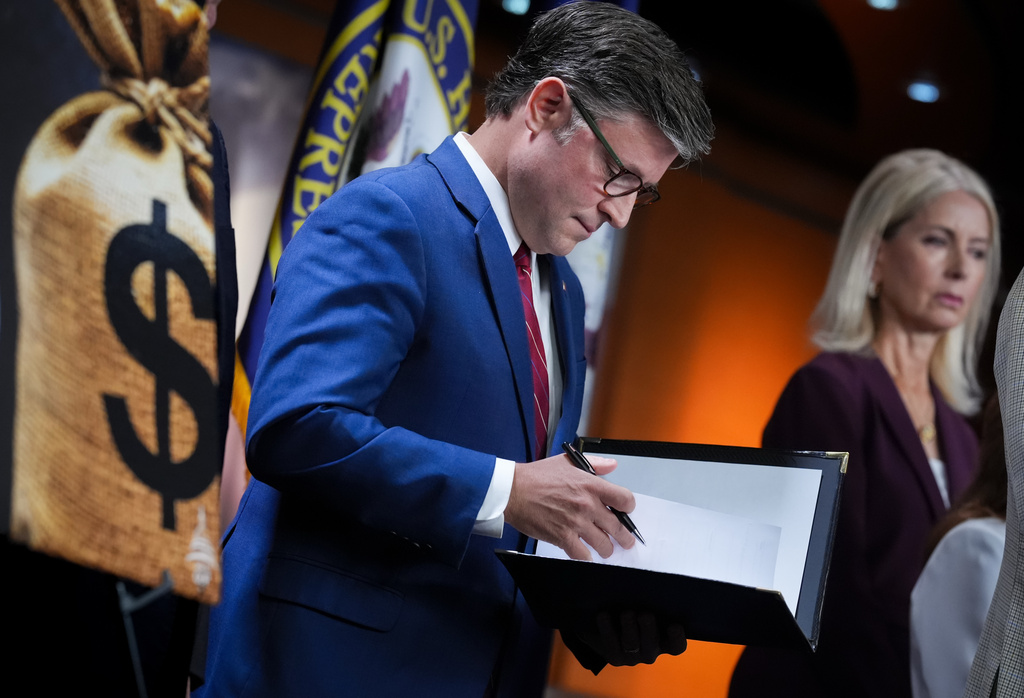 Speaker of the House Mike Johnson, R-La., joined by GOP leaders, prepares to talk to reporters at the Capitol in Washington, Wednesday, June 3, 2026. (AP Photo/J. Scott Applewhite)