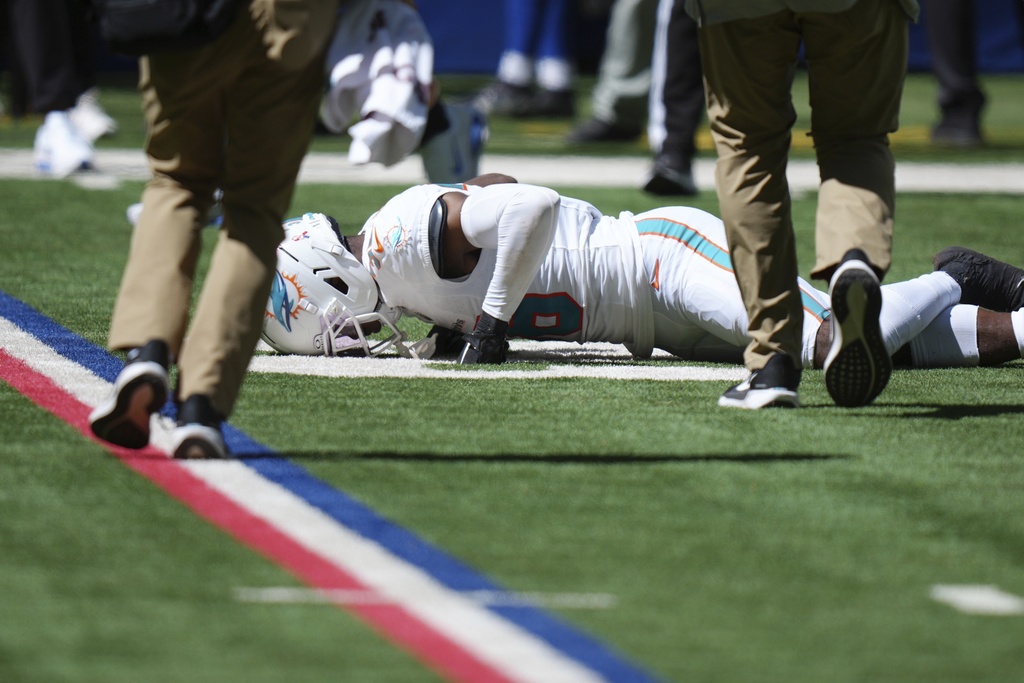 Miami Dolphins cornerback Storm Duck (36) reacts after an injury during the first half of an NFL football game against the Indianapolis Colts on Sunday, Sept. 7, 2025, in Indianapolis. (AP Photo/AJ Mast)