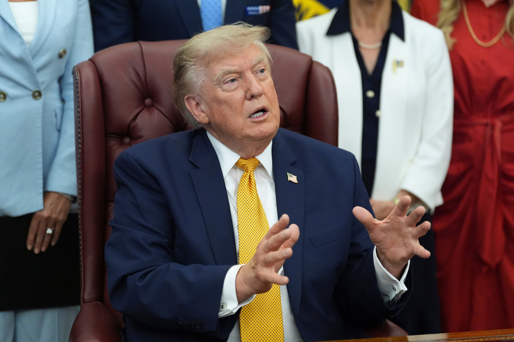 President Donald Trump speaks during a meeting about military families, in the Oval Office of the White House, Monday, Aug. 3, 2026, in Washington. (AP Photo/Alex Brandon)