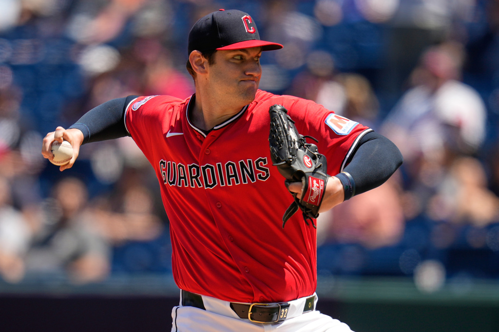 Cleveland Guardians' Gavin Williams pitches in the first inning of a baseball game against the Minnesota Twins in Cleveland, Thursday, July 23, 2026. (AP Photo/Sue Ogrocki)