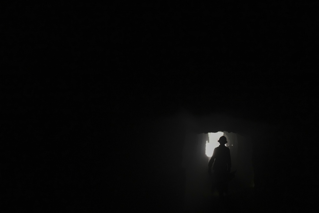 A worker enters a mercury mine in San Joaquin, Mexico, Tuesday, Aug. 19, 2025. (AP Photo/Fernando Llano)