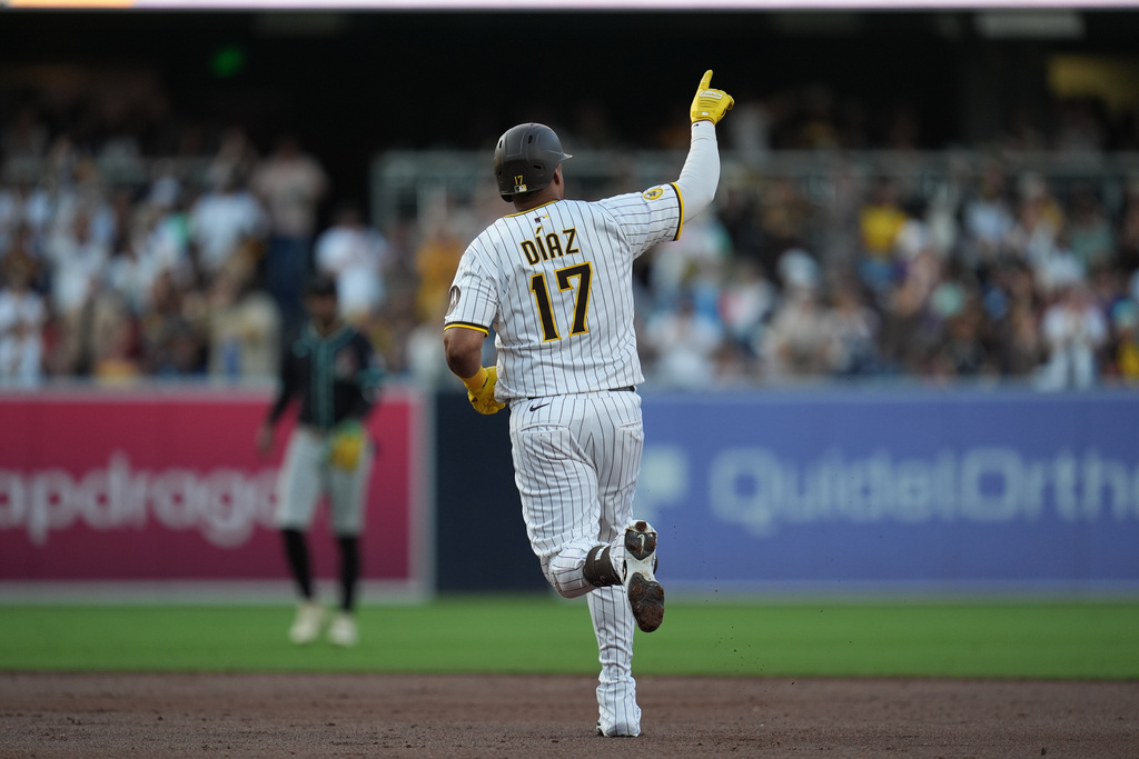 San Diego Padres' Elias Diaz celebrates after hitting a two-run home run during the second inning of a baseball game against the Arizona Diamondbacks Saturday, Sept. 27, 2025, in San Diego. (AP Photo/Gregory Bull)