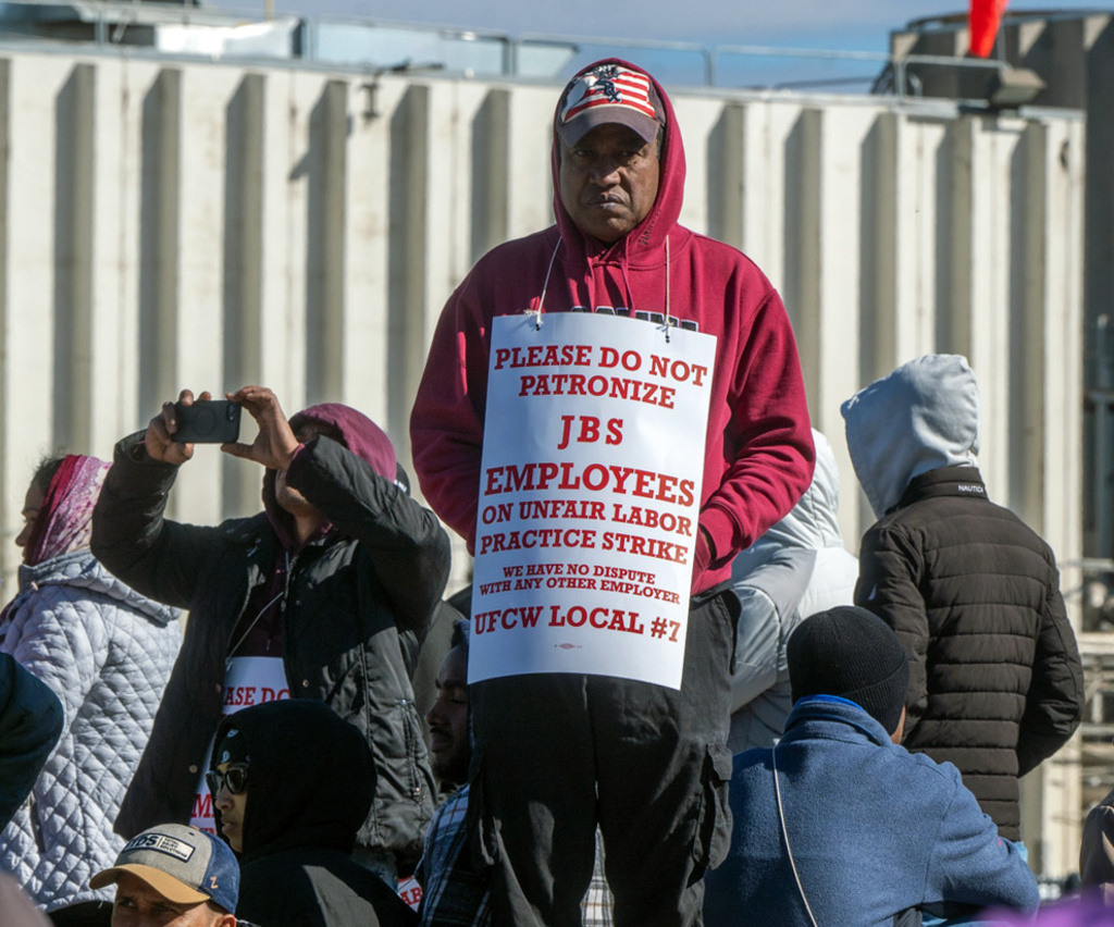 Workers from the JBS Beef Plant protest across the road from the plant on March 16, 2026 in Greeley, Colo. (Jerilee Bennett/The Gazette via AP)