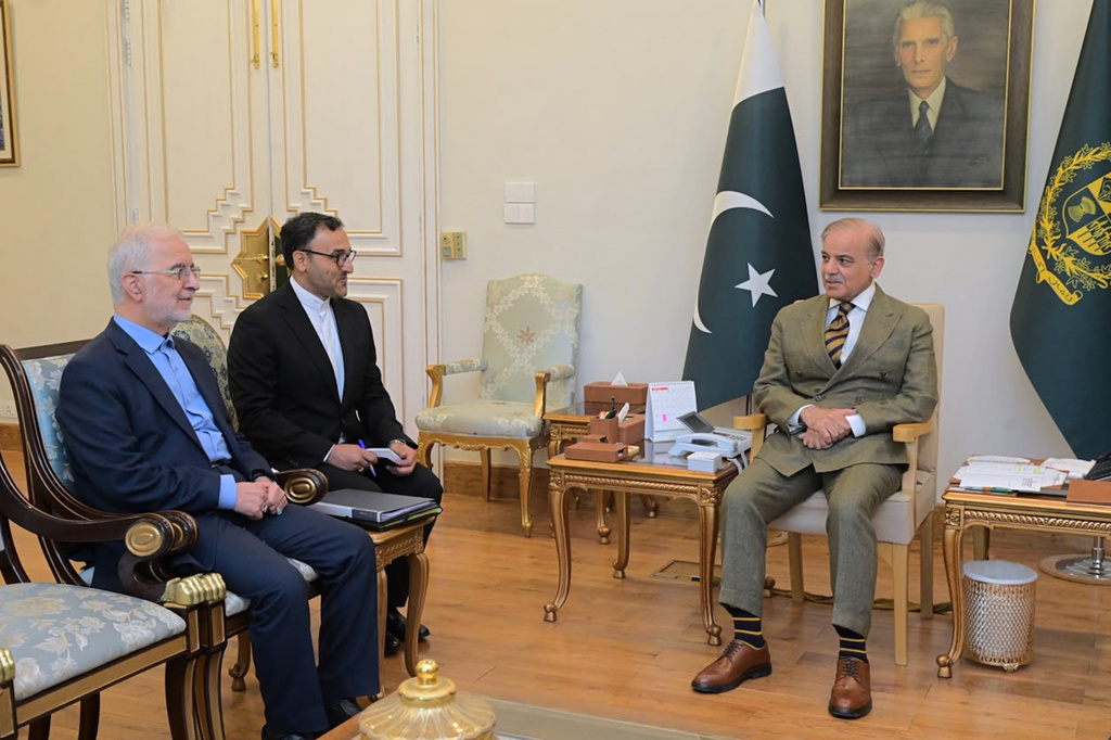 In this photo released by the Pakistan Prime Minister Office, Iran's Interior Minister Eskandar Momeni, left, meets with Pakistan's Prime Minister Shehbaz Sharif, right, in Islamabad, Pakistan, Tuesday, July 21, 2026. (Pakistan Prime Minister Office via AP)