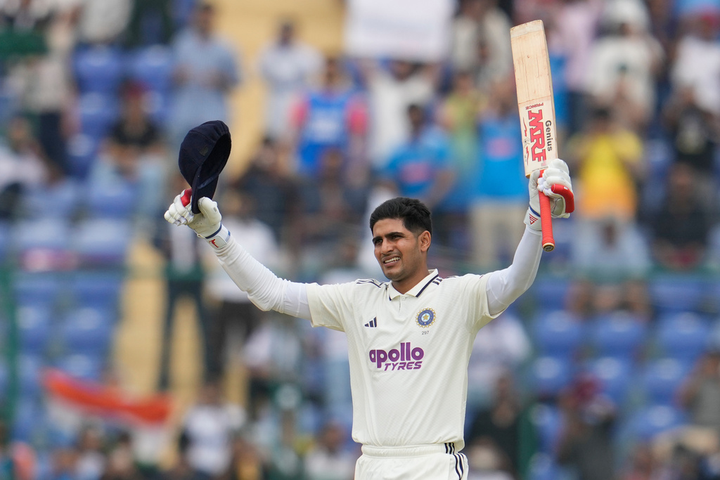 India's captain Shubman Gill celebrates after scoring a century on the second day of the second cricket test match between India and West Indies at the Arun Jaitley Stadium in New Delhi, India, Saturday, Oct.11, 2025. (AP Photo/Manish Swarup)