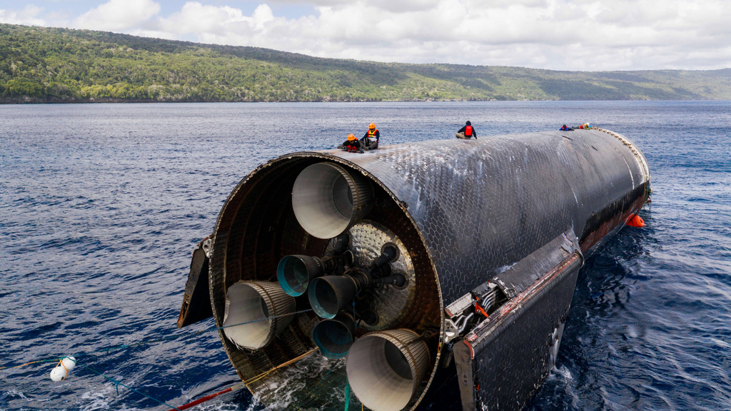This image provided by SpaceX on Aug. 27, 2026, shows engineers inspecting Starship off the coast of Christmas Island in the Indian Ocean, following its launch on a test flight back in July. (SpaceX via AP)