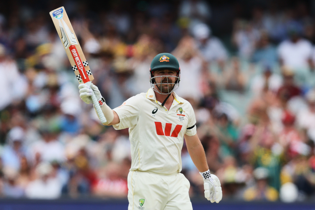 Australia's Travis Head reacts after scoring 50 runs during play on day three of the third Ashes cricket test between England and Australia in Adelaide, Australia, Friday, Dec. 19, 2025. (AP Photo/James Elsby)