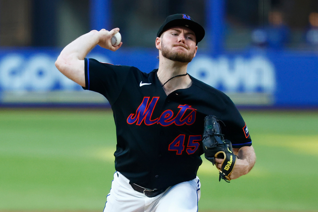 New York Mets' pitcher Christian Scott throws against the Kansas City Royals during the second inning of a baseball game, Wednesday, July 8, 2026, in New York. (AP Photo/Noah K. Murray)