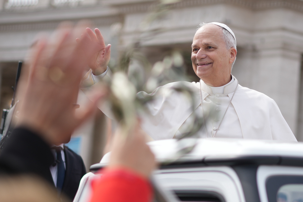 Pope Leo XIV leaves after presiding over Mass in St. Peter's Square at the Vatican on the Catholic feast of Palm Sunday, commemorating Jesus' arrival in Jerusalem, Sunday, March 29, 2026. (AP Photo/Andrew Medichini)