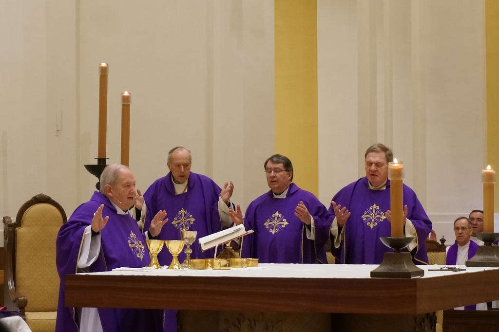 From left, Catholic Archbishop Bernard Hebda, and Cardinals Robert McElroy, Christophe Pierre and Joseph Tobin celebrate a Mass in solidarity with migrants at the Chapel of St. Thomas Aquinas in St. Paul, Minn., on Friday, Feb. 27, 2026 (AP Photo/Giovanna Dell'Orto)