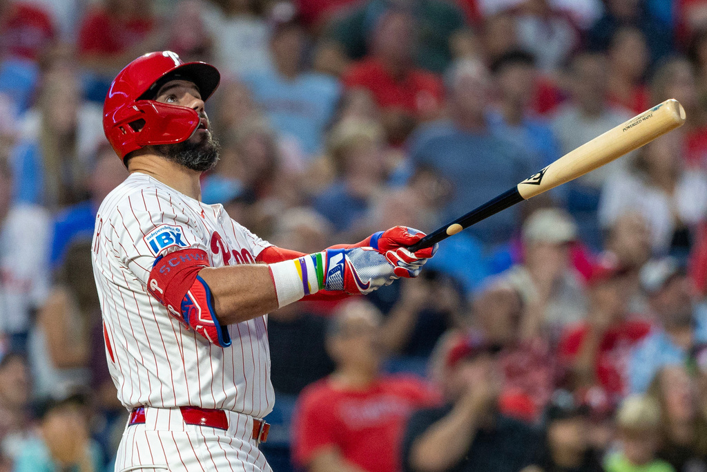 Philadelphia Phillies designated hitter Kyle Schwarber watches the ball after hitting a solo home run in the first inning of a baseball game against the Miami Marlins, Tuesday, Sept. 23, 2025, in Philadelphia. (AP Photo/Laurence Kesterson)