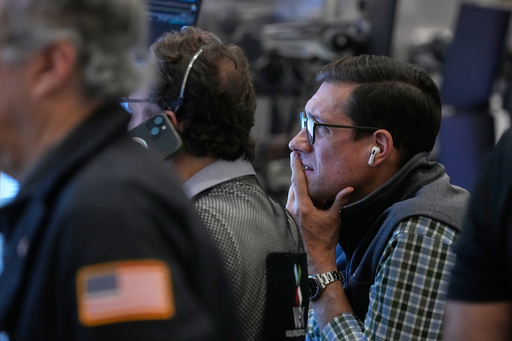 Options trader Rob Pilles, right, works on the floor of the New York Stock Exchange, Monday, Oct. 27, 2025. (AP Photo/Richard Drew) Options trader Rob Pilles, right, works on the floor of the New York Stock Exchange, Monday, Oct. 27, 2025. (AP Photo/Richard Drew)