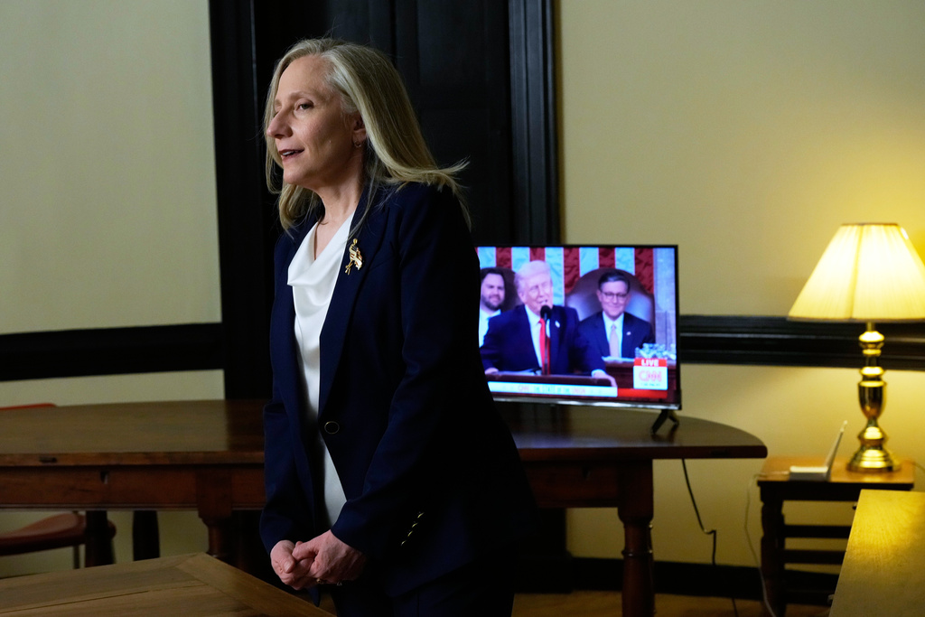 Virginia Gov. Abigail Spanberger listens to President Donald Trump's State of the Union address, Tuesday, Feb. 24, 2026, in Williamsburg, Va. Spanberger will deliver the Democratic response after the address. (AP Photo/Steve Helber, Pool)