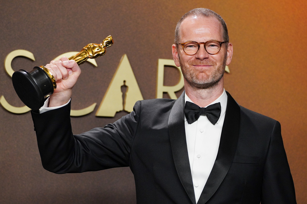 Joachim Trier, winner of the award for international feature film for "Sentimental Value," poses in the press room at the Oscars on Sunday, March 15, 2026, at the Dolby Theatre in Los Angeles. (Photo by Jordan Strauss/Invision/AP)