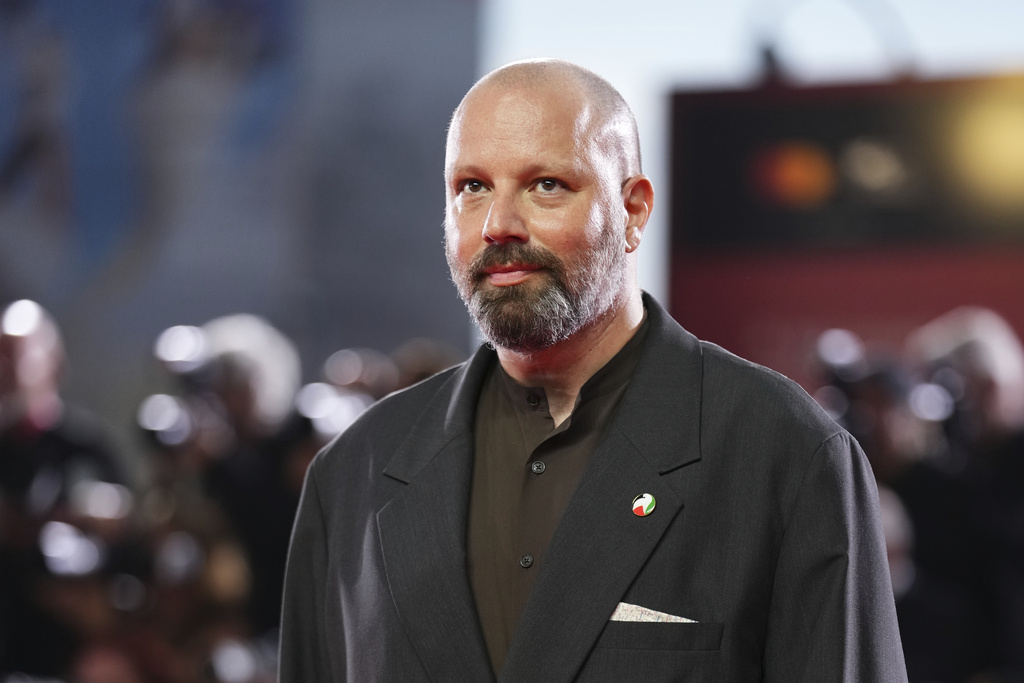 Director Yorgos Lanthimos poses for photographers on the red carpet for the film 'Bugonia' during the 82nd edition of the Venice Film Festival in Venice, Italy, on Thursday, Aug. 28, 2025. (Photo by Scott A Garfitt/Invision/AP)