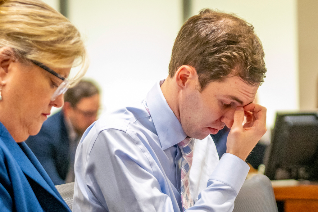 Attorney Kathryn Nester, left, sits next to Tyler Robinson, who is accused of fatally shooting Charlie Kirk, during a hearing, Thursday, Dec. 11, 2025, in Fourth District Court in Provo, Utah. (Rick Egan/The Salt Lake Tribune via AP, Pool)