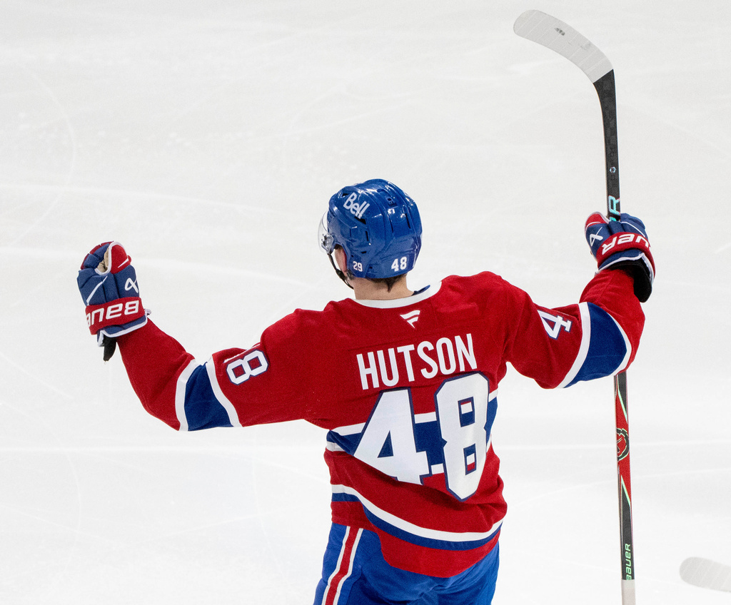 Montreal Canadiens' Lane Hutson celebrates after his winning goal against the Tampa Bay Lightning during overtime of Game 3 in a first-round NHL hockey Stanley Cup playoff series in Montreal, Friday, April 24, 2026. (Christinne Muschi/The Canadian Press via AP)