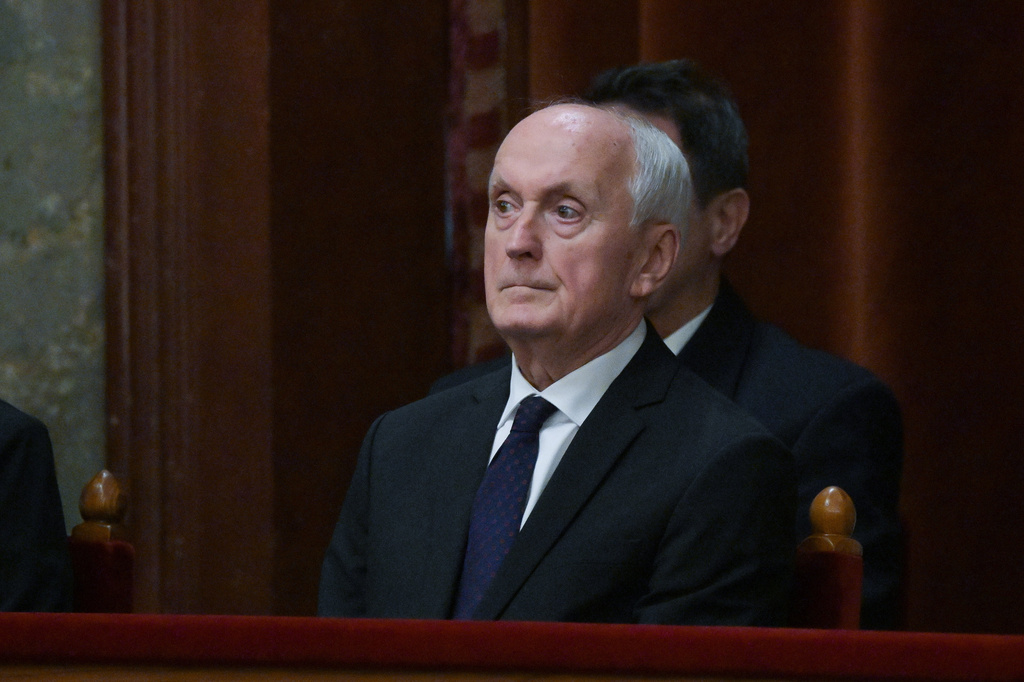 Andras Baka, sole candidate of the Tisza Party for President of the Republic of Hungary and former President of the Supreme Court attends the presidential election during the extraordinary plenary session of the Parliament in Budapest, Hungary, Tuesday, Aug.11, 2026. (Zoltan Balogh/MTI via AP)