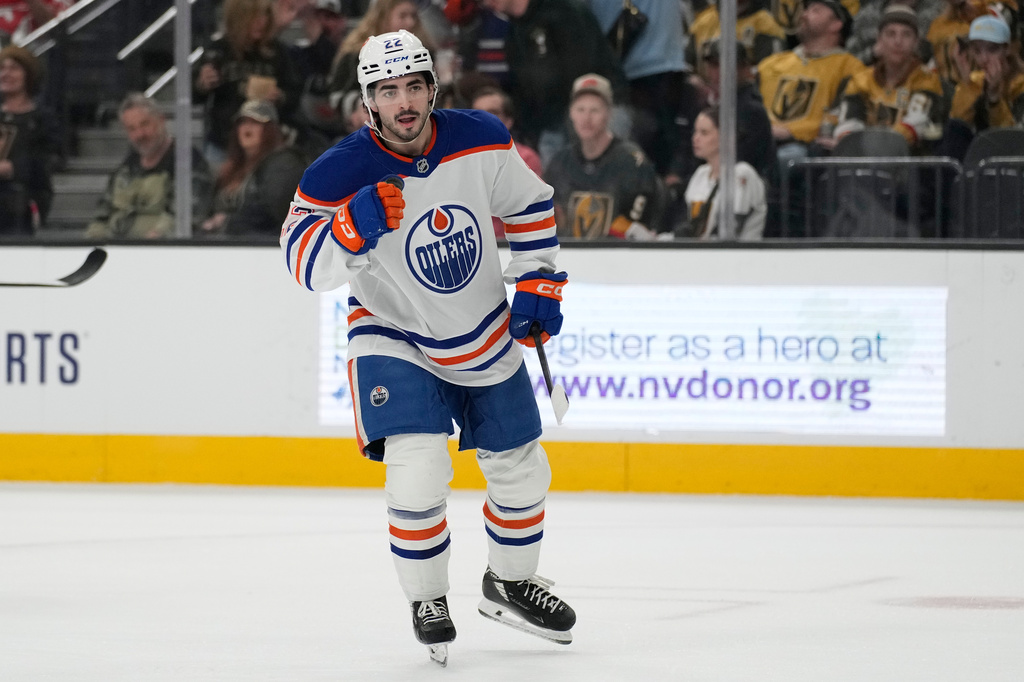 Edmonton Oilers center Matt Savoie (22) celebrates after scoring against the Vegas Golden Knights during the first period of an NHL hockey game Thursday, March 26, 2026, in Las Vegas. (AP Photo/John Locher)