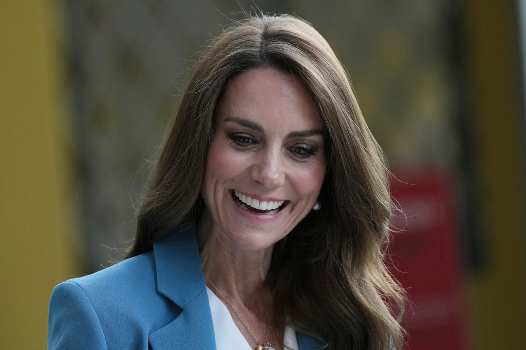Britain's Kate, Princess of Wales, arrives at the Loris Malaguzzi International Centre and will take part in an immersive clay atelier workshop, part of a two-day trip, in Reggio Emilia, Italy, Wednesday, May 13, 2026. (AP Photo/Antonio Calanni, Pool)