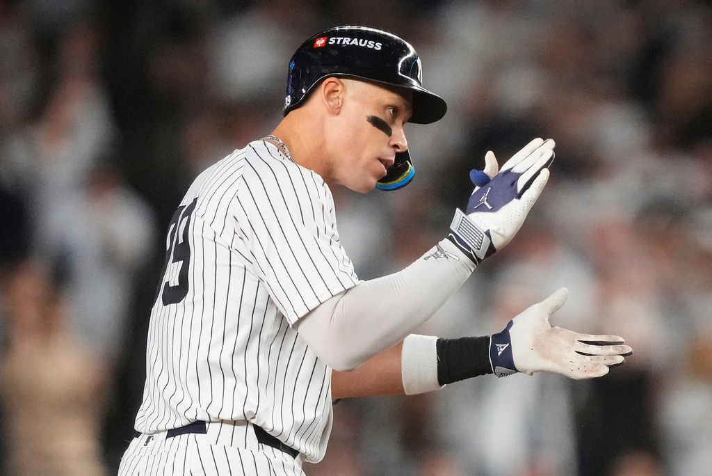New York Yankees' Aaron Judge reacts after hitting a double against the Toronto Blue Jays during the third inning of Game 3 of baseball's American League Division Series, Tuesday, Oct. 7, 2025, in New York. (AP Photo/Yuki Iwamura)