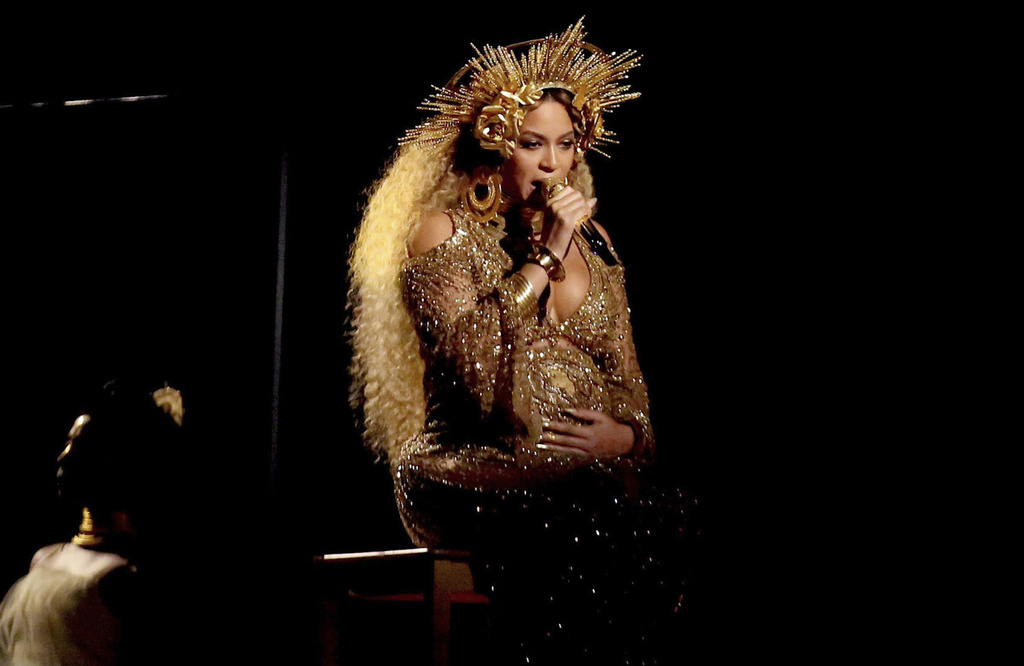 FILE - Beyonce performs at the 59th annual Grammy Awards on Sunday, Feb. 12, 2017, in Los Angeles. (Photo by Matt Sayles/Invision/AP, file)