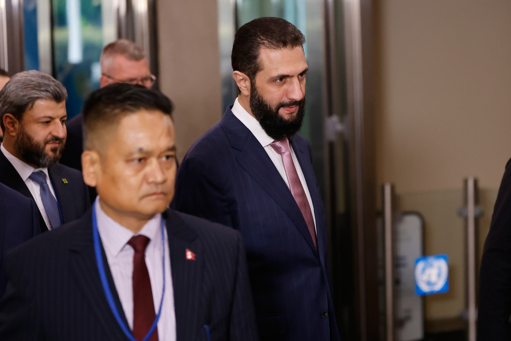 Syria's President Ahmed al-Sharaa, right, arrives ahead of the 81st session of the United Nations General Assembly at United Nations headquarters, Tuesday, Sept. 22, 2026. (AP Photo/Stefan Jeremiah)