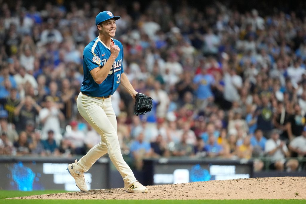 Milwaukee Brewers' Jacob Misiorowski reacts after striking out a Philadelphia Phillies batter during the eighth inning of a baseball game Friday, June 12, 2026, in Milwaukee. (AP Photo/Aaron Gash)