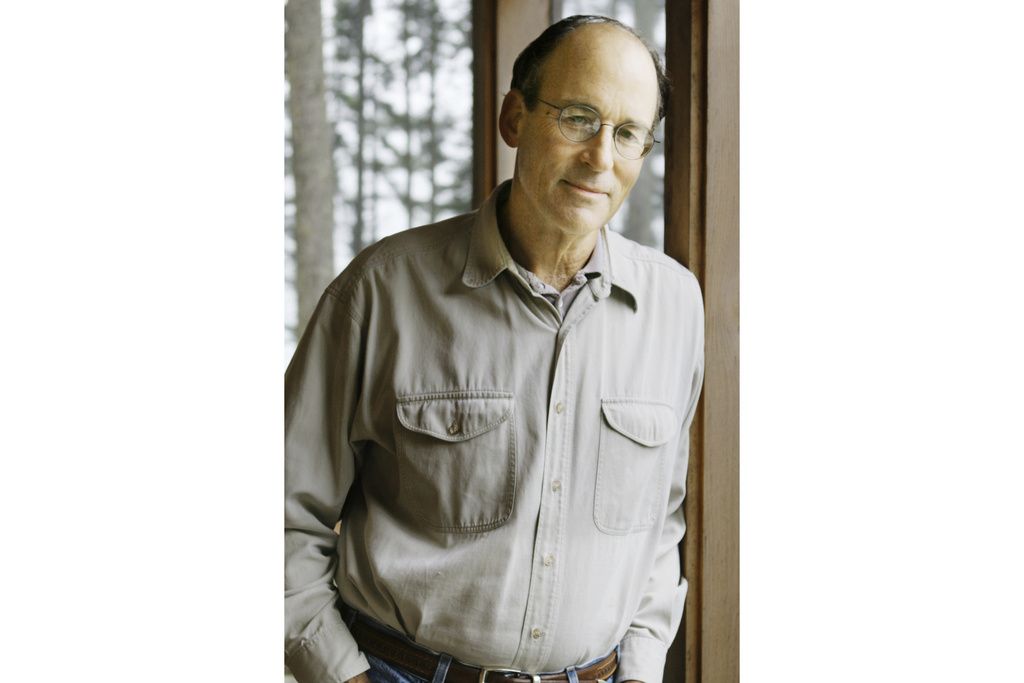 FILE - Author Tracy Kidder stands in his cottage, in South Bristol, Maine, on Sept. 26, 2005. (AP Photo/Pat Wellenbach, File)