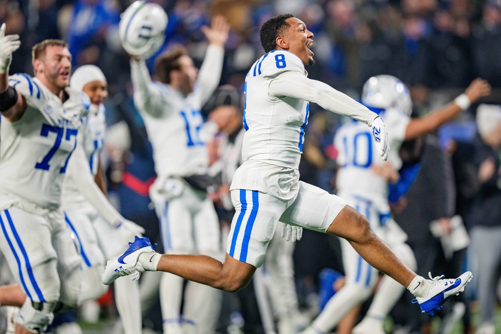 Duke wide receiver Jayden Moore (8) reacts after winning the Atlantic Coast Conference championship NCAA college football game against Virginia, Saturday, Dec. 6, 2025, in Charlotte, N.C. (AP Photo/Jacob Kupferman)