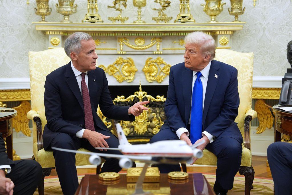 FILE - Canadian Prime Minister Mark Carney speaks during a meeting with President Donald Trump at the White House, Oct. 7, 2025, in Washington. (AP Photo/Evan Vucci, File)