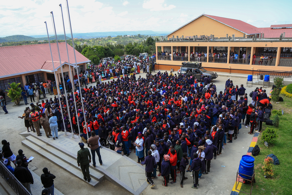 Students gather after a fire at Utumishi Girls School in Gilgil, central Kenya, Thursday, May 28, 2026. (AP Photo/Andrew Kasuku)