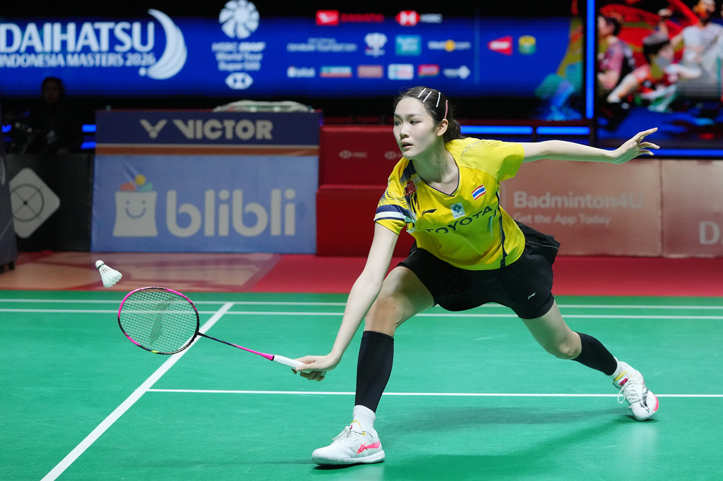 FILE - Thailand's Pitchamon Opatniputh plays against China's Chen Yu Fei during their women's single final match at the Indonesia Masters badminton tournament in Jakarta, Indonesia, Sunday, Jan. 25, 2026. (AP Photo/Achmad Ibrahim, File)