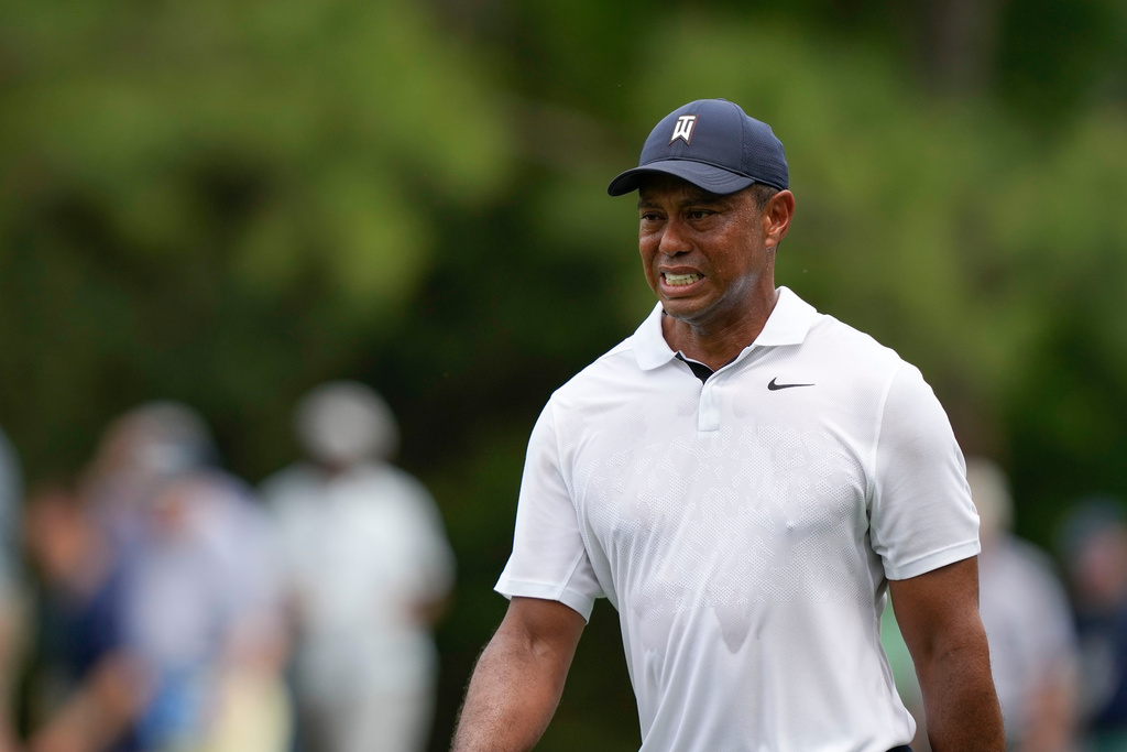 FILE - Tiger Woods grimaces on the 15th hole during the first round of the Masters golf tournament at Augusta National Golf Club on Thursday, April 6, 2023, in Augusta, Ga. (AP Photo/David J. Phillip, File)