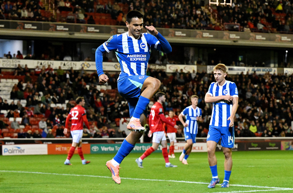 Brighton and Hove Albion's Diego Gomez celebrates scoring during the English League Cup third round soccer match between Barnsley and Brighton & Hove Albion at Oakwell Stadium, Barnsley, England, Tuesday Sept. 23, 2025. (Cody Froggatt/PA via AP)