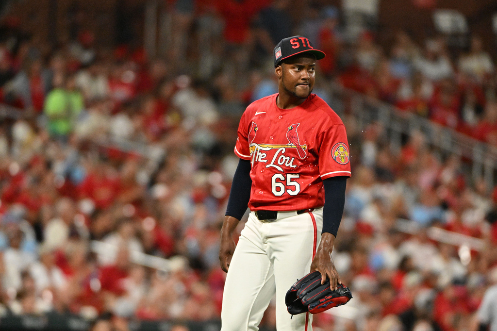 St. Louis Cardinals pitcher George Soriano looks on after giving up a 2-run home run to Cincinnati Reds' baseman Eugenio Suárez during the seventh inning of a baseball game, Friday, July 24, 2026, in St. Louis. (AP Photo/Jeff Le)