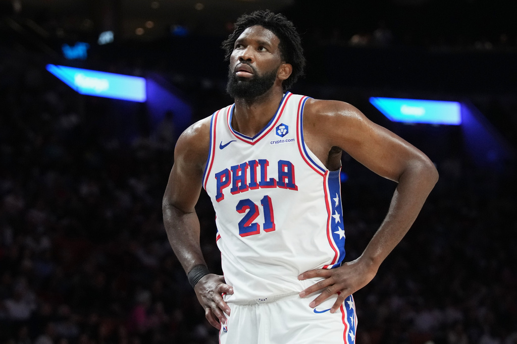 Philadelphia 76ers center Joel Embiid (21) reacts during the second half of an NBA basketball game against the Miami Heat, Monday, March 30, 2026, in Miami. (AP Photo/Lynne Sladky)