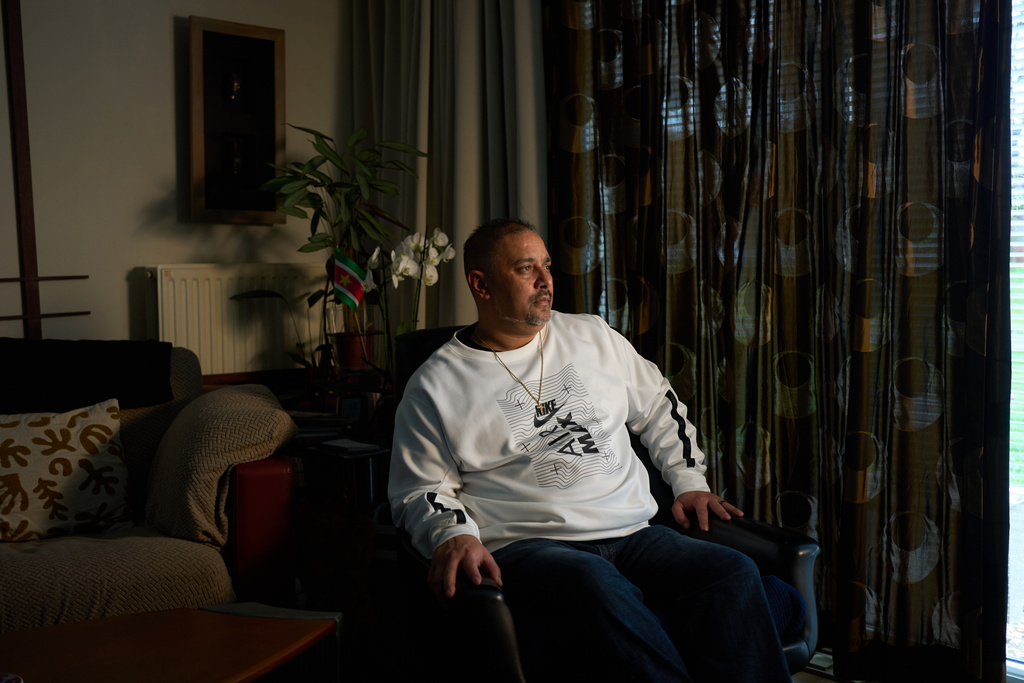 Owen Ramsingh, who spent months in Camp East Montana before his deportation to The Netherlands, poses for a portrait in his father's home in Utrecht, Netherlands, Sunday, March 1, 2026. (AP Photo/Bram Janssen)