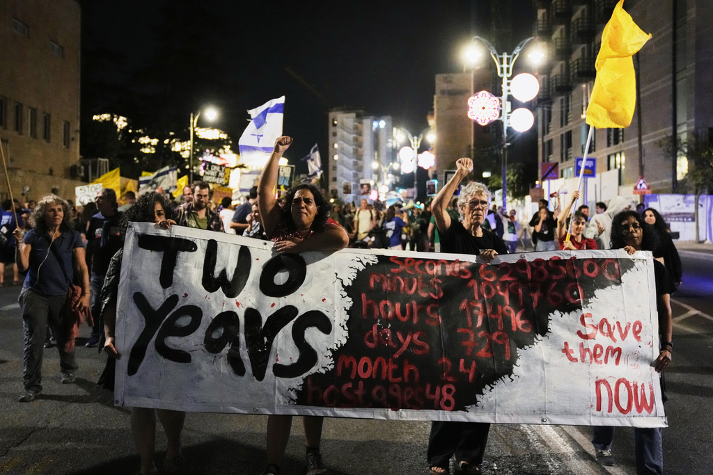 Relatives and supporters of Israeli hostages held in the Gaza Strip take part in a protest demanding their release from Hamas captivity and calling for an end to the war, in Jerusalem, Saturday, Oct. 4, 2025. (AP Photo/Mahmoud Illean)