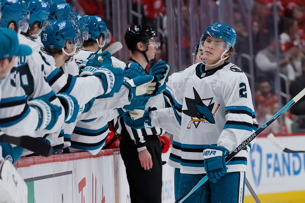 FILE - San Jose Sharks center Will Smith (2) celebrates with teammates after scoring against the Detroit Red Wings during the first period of an NHL hockey game Jan. 16, 2026, in Detroit. (AP Photo/Duane Burleson, File)