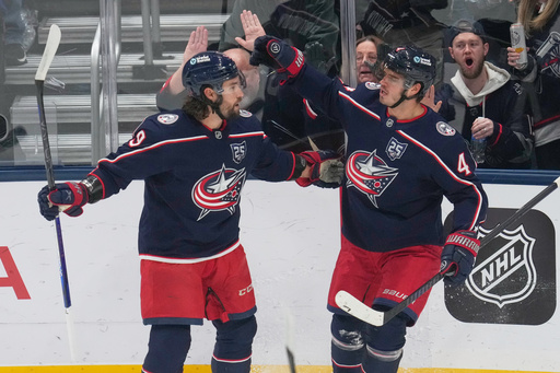 Columbus Blue Jackets center Cole Sillinger (4) celebrates his goal with defenseman Ivan Provorov (9) in the first period of an NHL hockey game against the Toronto Maple Leafs in Columbus, Wednesday, Oct. 29, 2025. (AP Photo/Sue Ogrocki) Columbus Blue Jackets center Cole Sillinger (4) celebrates his goal with defenseman Ivan Provorov (9) in the first period of an NHL hockey game against the Toronto Maple Leafs in Columbus, Wednesday, Oct. 29, 2025. (AP Photo/Sue Ogrocki)