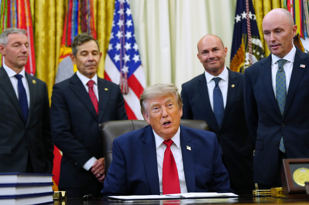 President Donald Trump speaks before signing executive orders modifying the Grand Staircase-Escalante National Monument and the Bears Ears National Monument in the Oval Office of the White House, Monday, July 13, 2026, in Washington. (AP Photo/Julia Demaree Nikhinson)