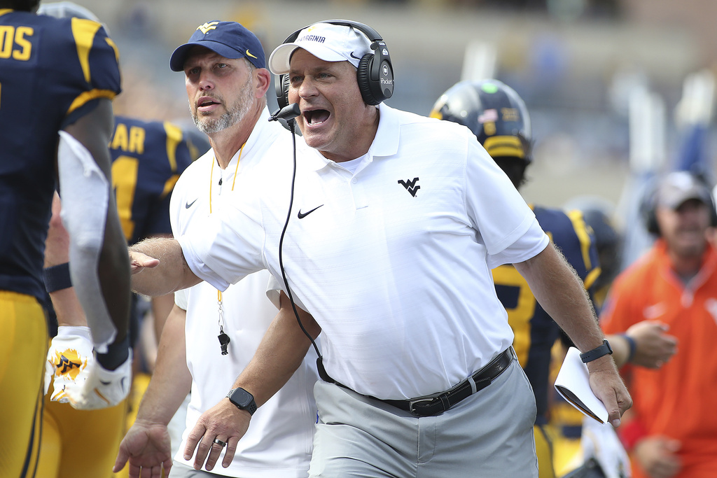 West Virginia coach Rich Rodriguez reacts after a touchdown against Pittsburgh during the first half of an NCAA college football game Saturday, Sept. 13, 2025, in Morgantown, W.Va. (AP Photo/Kathleen Batten)