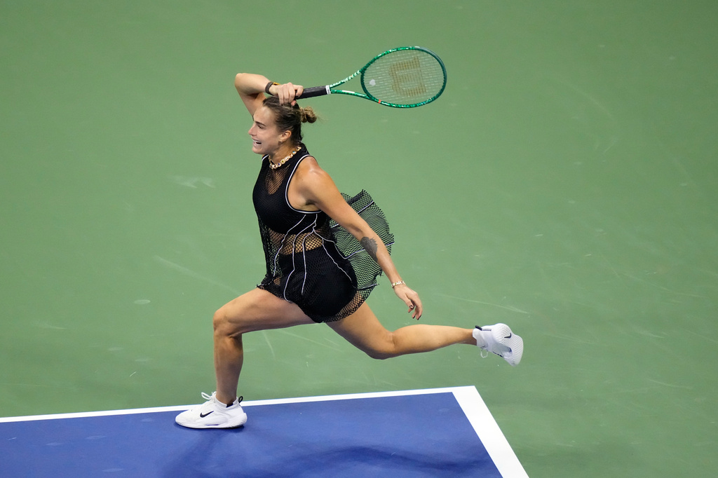 Aryna Sabalenka, of Belarus, follows through on a shot to Jessica Pegula, of the United States, during the women's singles semifinals of the U.S. Open tennis championships Thursday, Sept. 10, 2026, in New York. (AP Photo/Frank Franklin II)