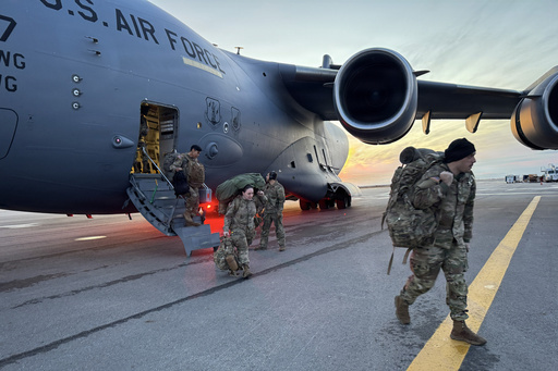 In this photo provided by Alaska National Guard, members of the Alaska National Guard arrive in Kotzebue, Alaska, Monday, Oct. 13, 2025, to support operations responding to the damage caused by Typhoon Halong. (Alaska National Guard via AP) In this photo provided by Alaska National Guard, members of the Alaska National Guard arrive in Kotzebue, Alaska, Monday, Oct. 13, 2025, to support operations responding to the damage caused by Typhoon Halong. (Alaska National Guard via AP)